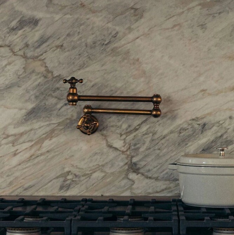 Rustic Wooden Range Hood with Brass Pot Filler