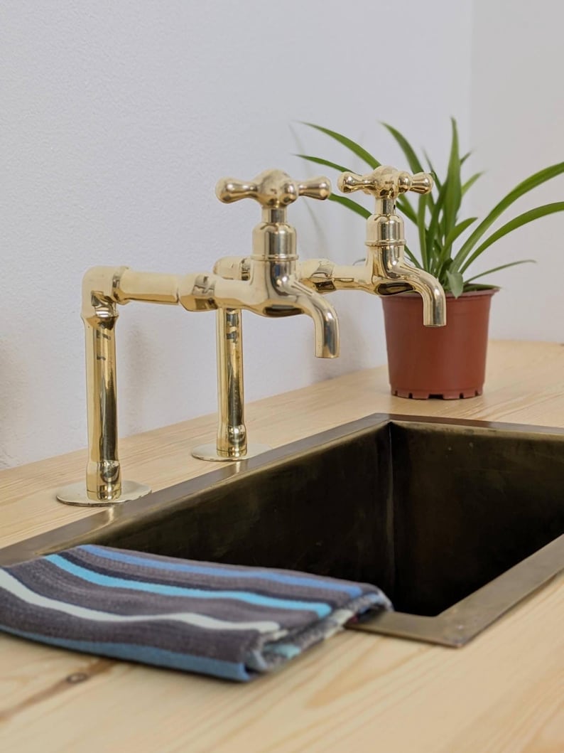 Unlacquered Brass kitchen and Bathroom Faucets