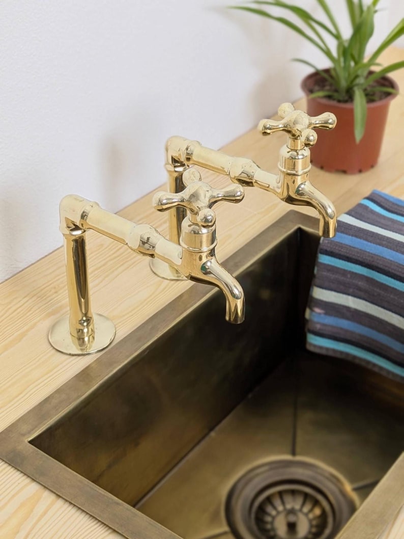 Unlacquered Brass kitchen and Bathroom Faucets