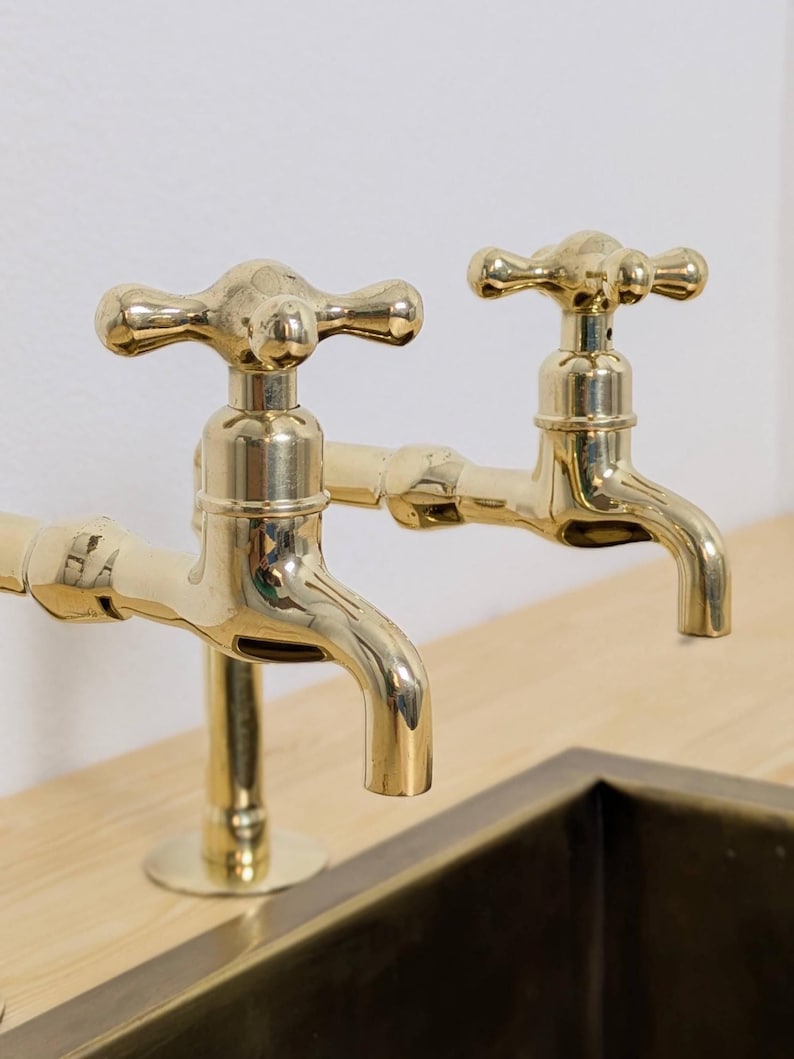 Unlacquered Brass kitchen and Bathroom Faucets