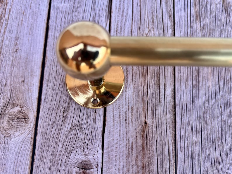 Sleek Unlacquered Brass Towel Rod