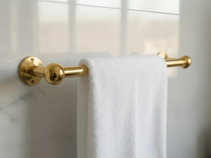 Sleek Unlacquered Brass Towel Rod