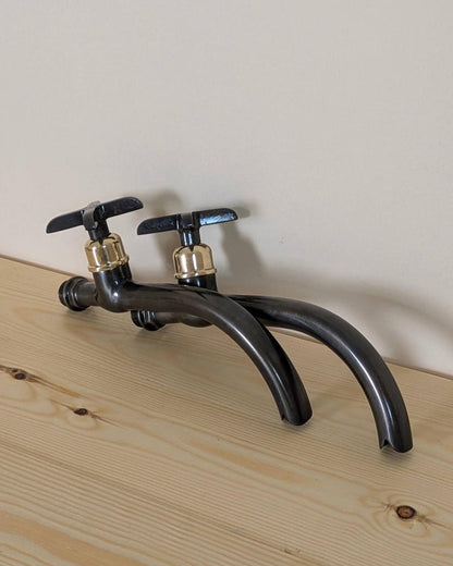 Matte Black Curved Wall-Mount Faucet