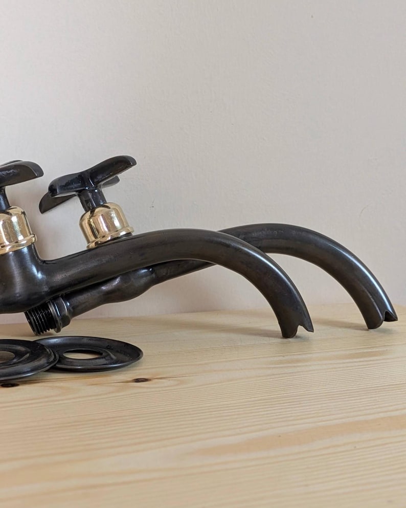 Matte Black Curved Wall-Mount Faucet