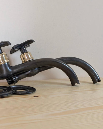 Matte Black Curved Wall-Mount Faucet