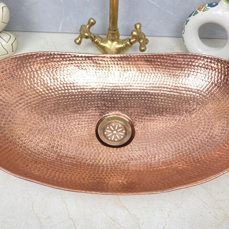 Hand-Hammered Oval Copper Sink with Vintage Brass Faucet