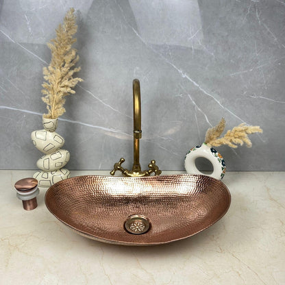 Hand-Hammered Oval Copper Sink with Vintage Brass Faucet