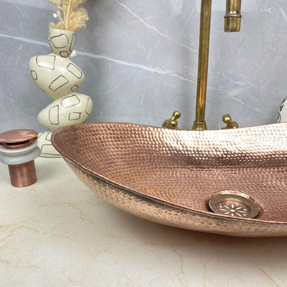 Hand-Hammered Oval Copper Sink with Vintage Brass Faucet