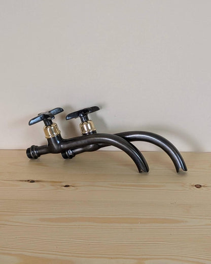 Matte Black Curved Wall-Mount Faucet