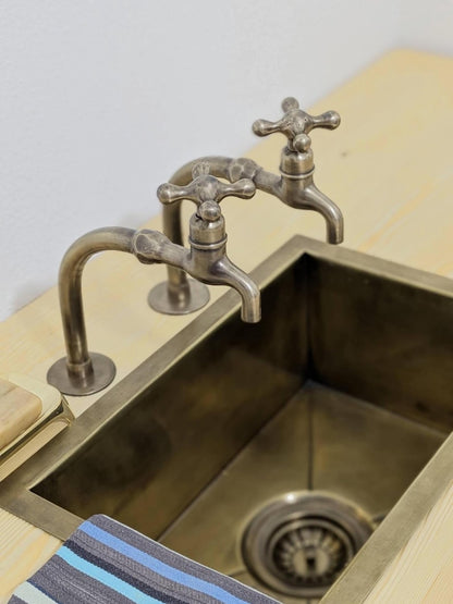 Copper Alchemy: Handcrafted Rustic Verdigris Arch Faucet