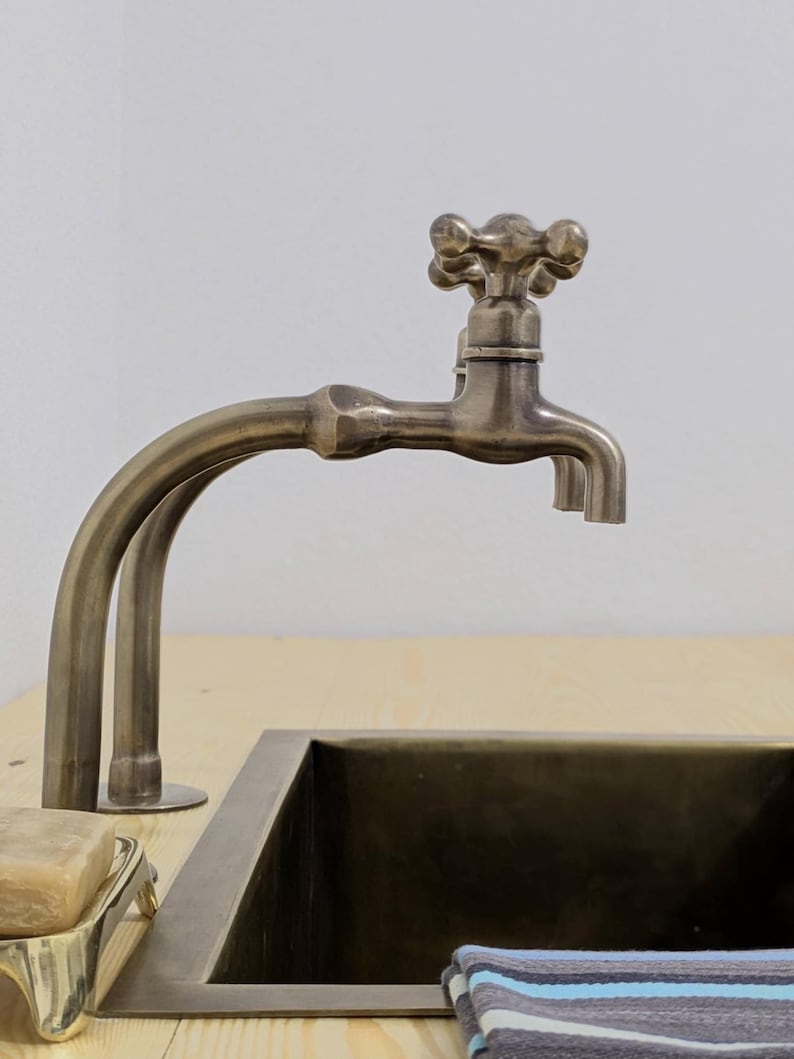 Copper Alchemy: Handcrafted Rustic Verdigris Arch Faucet