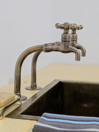 Copper Alchemy: Handcrafted Rustic Verdigris Arch Faucet
