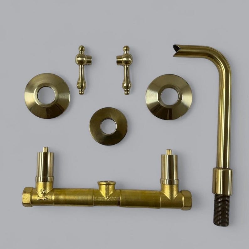 Minimalist Unlacquered Brass Wall-Mounted Faucet